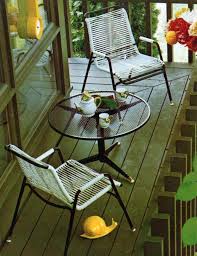 Finished in delicate sepia tones, the tops of beach umbrellas gently recede into the distance, inviting an ambiance of nostalgic whimsy. See 60 Vintage Patio Furniture Sets That Offered Outdoor Relaxation The Old Fashioned Way Click Americana