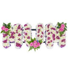 Mom wanted to have a use for the flowers that people sent and suggested the candles. Purple White Mum Tribute Order Funeral Flowers For Next Day Delivery