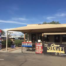 She has a white pinstripe cape s. Que Suave Barber Shop Llc Barber Shop In Phoenix