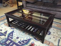 16w x 26d x 24h. Klaussner Case Goods Two Tier Wood And Glass Coffee Table