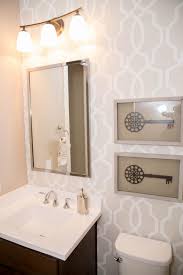 Neutral Graphic Wallpaper Takes This Small Bathroom From Basic To Chic Small Bathroom Trends Small Bathroom Remodel Bathroom Trends
