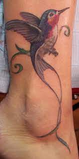 Hummingbird Tattoo On Leg Hawaiian Tattoos Bird Tattoo Ribs Bird Tattoo Meaning