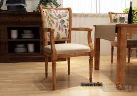 Solid teak wood (saag) dining chairs that look good and feel good. Buy Orchid Arm Chair Irish Cream Rosy Leaf Online In India Wooden Street