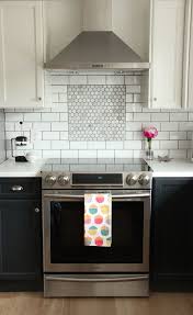 As these cooking spaces prove, this reliably stylish tile has major the black subway tile makes the white cabinetry pop and it picks up the farmhouse pulls. White Subway Tile Backsplash With Herringbone Accent Novocom Top