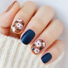 You'd never guess the trick to getting the dark moody red color at the base of these jelly nails (spoiler: 42 Super Pretty Flower Nail Designs To Copy