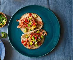 Serve with glasses of ice water garnished with a slice of orange and a sprig of fresh mint. Tomato Braised Chicken Tacos Recipe Braised Chicken Chicken Tacos Chicken Taco Recipes