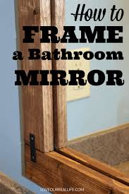 The one that remained was a basic plate glass mirror that was glued to the wall. How To Build A Diy Frame To Hang Over A Bathroom Mirror Love Our Real Life