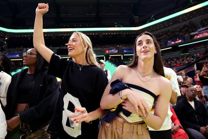 Caitlin Clark may be out with injury but she's plenty active on sidelines