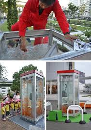 Phone Booths Converted To Aquariums In Osaka I Love This Old Phone Phone Booth Phone