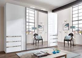 By now you already know that, whatever you are looking for, you're sure to find. Instrument Kenai White Gloss Sliding Synchro Wardrobe With Mirror W350 X D65 X H216 4 Sli Bedroom Cupboard Designs Cupboard Design Bedroom Closet Design