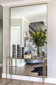 It should be hung so the tallest person in your house's eye level is 1/3 of the way down. 21 Hallway Decor Ideas To Woo Your Guests Home Entrance Decor Hall Decor Entrance Hall Decor