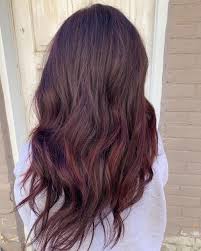 With hints of gold and mahogany for the perfect layered brown, this cozy shade will have you reaching for a sweater and ready to curl up by a fireplace. 15 Mahogany Hair Color Shades You Have To See
