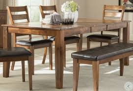 It is finished with a chestnut colored top and espresso base. Kona Warm Brandy Butterfly Leaf Extendable Dining Table From Intercon Coleman Furniture