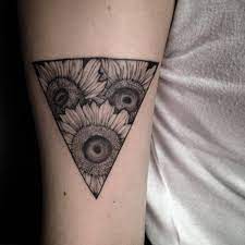 Sunflower Triangle Tattoo On The Right Bicep Tattoo Artist Ivy Saruzi Glyph Tattoo Bicep Tattoo Sunflower Tattoo Sleeve