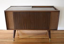 Sure to be a conversation starter, our console was designed around that most classic of media components, the record player. Mid Century Modern Mini Record Player Stereos Picked Vintage