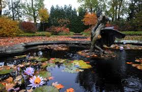 Harvey ladew trims up a swan in. Ladew Topiary Gardens