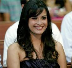 Vilfredo Schurmann e suas afilhadas, formandas da Unisul em seu veleiro