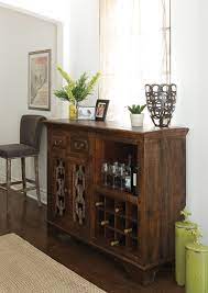 When space is at a premium in small homes or apartments, the use of a dining table with wine storage is an optimal solution. Wine Cabinet Buffet Design American Traditional Dining Room Houston By Zin Home Houzz
