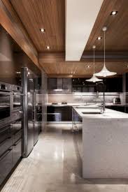 Modern kitchen interior design in black and white style with vertical grained wooden cabinets, and a black granite bench top. 57 Amazing Contemporary Kitchen Cabinets Remodel Ideas Contemporarykitchen Cabi Kitchen Interior Design Modern Modern Kitchen Interiors Modern Kitchen Layout