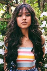 This hairstyle with bangs starts with eyebrow length bangs cut straight across the forehead. A Fringe Is Always Fun Especially When You Have Beachy Waves Beach Wave Hair Hair Waves Hair Styles