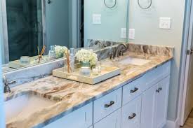 Because of the benefits quartz offers, the material is a terrific fit for a bathroom vanity top, backsplash and more. Quartz Granite Or Marble For Bathroom Vanity Which Is Best The Bathtubber