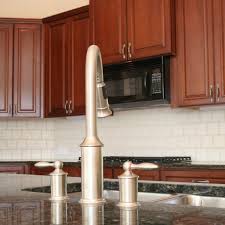 Laminate countertop in white ice granite with ora edge and integrated backsplash. Best Kitchen Backsplash Ideas For Dark Cabinets Family Handyman