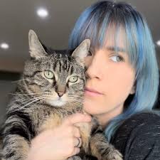 Penny The Cat receives compliments and affection