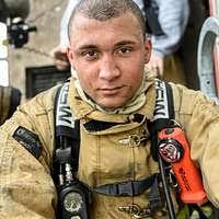 Staff Sgt. Christina Andros looks through the smoke