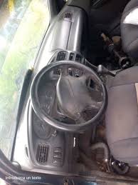 Por pieza Ford láser 97 automático 04162229699