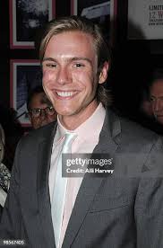 Dick Button and Dennis Grimaldi attend the Off-Broadway opening night...  News Photo