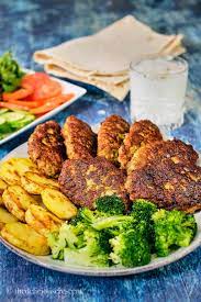 Kotlet is a persian dish made with ground beef and lamb mixed with spices and eggs and fried in a pan. Kotlet Persian Meat Patties The Delicious Crescent