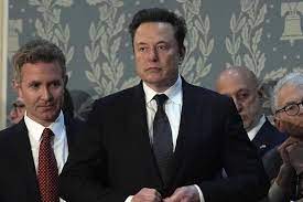 FILE - Elon Musk arrives before a joint meeting of Congress at the Capitol  in Washington, July 24, 2024. The secretaries of state from Michigan,  Minnesota, New Mexico, Pennsylvania and Washington are