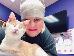 Hilarious rescue cat sits in a human squat and plays fetch like a dog.