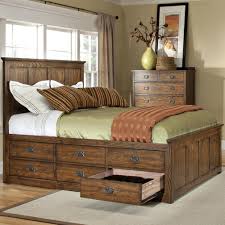 If your bedroom is more bed than room, look at it as a storage opportunity. Intercon Oak Park Mission Queen Panel Bed With 9 Underbed Storage Drawers Wayside Furniture Panel Beds