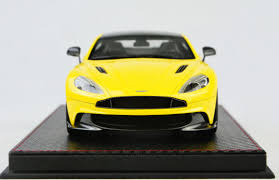 Image result for Sunburst Yellow 2017 Aston Martin