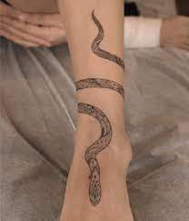 Brown Peanut On Instagram Ornament In Snake Tattoo Mandala Ornaments Ornamenttattoo Tattoos Snake Ankle Tattoo Foot Tattoos