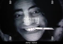 Jackie Boy Benicio Del Toro dirty cop violence police rafferty jack rafferty  corrupt police officer bizarre surreal face underwa Stock Photo