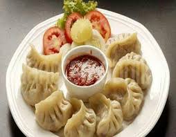 Momo Nepalese Dumplings It Is Very Popular In Nepal It Can Be Found In The Street And Also In Five Star Hotels Momos Recipe Delicious Snacks Recipes Food
