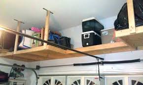 Overhead garage storage can be a livesaver when you want to make the most of every inch of space to keep things organized. Want An Easy Fix For Your Garage Overhead Organizer Read This Coolyeah Garage Organization Caster Wheels