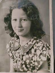 I made her look like my beautiful daughter Ondrea Shallbetter. She's got  golden brown skin, and curly black hair.