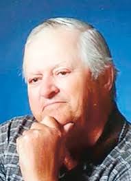 James L. Whitcomb, 74