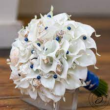 Rose wedding bouquet white wedding bouquets bride bouquets floral wedding trendy wedding bridesmaid bouquets purple bouquets wedding beach bridesmaid bouquet wedding bouquets calla lily bouquet plum wedding deep burgundy special events instagram posts flowers mini. 34 Seashell Bouquet Collection By The Bridal Flower Ideas Seashell Bouquet Bridal Flowers Wedding Hands