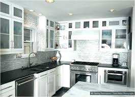 A black and white kitchen décor is a classic style that never goes out of date, making it the ideal choice for people who are not too enthusiastic about changing just because the kitchen décor uses black and white colors does not mean you should stick to the absolute whites and darkest blacks. Dark White Kitchen Cabinets Black Cabinet Homepimp