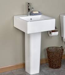 The sleek chrome stand is designed to be as practical as it is stylish and it offers the perfect spot for a hand towel. Arena Pedestal Sink The Square Shape Of This Small Pedestal Sink Works Well In A Modern Bathroo Modern Bathroom Sink Modern Pedestal Sink Small Bathroom Sinks
