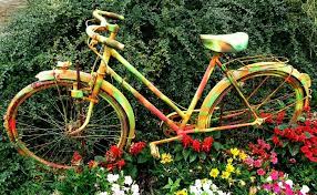 Wrought iron garden wall décor. 31 Fun And Whimsical Bicycle Planters For Your Garden And Yard