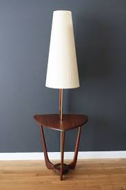Improving the quality of life through design some people look for beautiful place others make a place beautiful. Floor Lamp With Attached Table Mid Century Floor Lamps Mid Century Modern Lamps Modern Floor Lamps