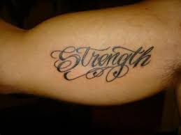 The words are written in black, italic set against a light gray background. Best 22 Inner Bicep Tattoo Words Ideas