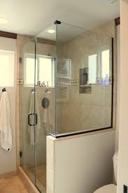 A Subway Tiled Shower Enclosed With Frameless Glass Makes For A Functional And Unfussy Bath For Teens Desc Half Wall Shower Bathroom Design Small Shower Doors