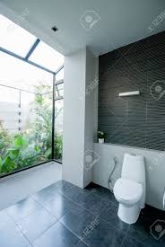 I built an outdoor bathroom with hot water shower, sink and toilet on the cheap. Toilet In Modern Outdoor Bathroom Interior Stock Photo Picture And Royalty Free Image Image 91616513