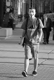Kirsten Wilson Street Photography Downtown Salt Lake City Utah Skater Boy Hiding Behind A Mask Street Photography Salt Lake City Downtown Skater Boy